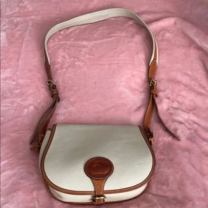 Dooney & Bourke buckle front flap shoulder bag